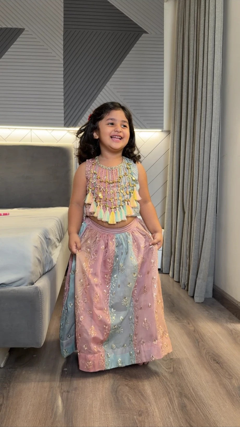 Pastel tassel lehenga set with embroidered striped skirt