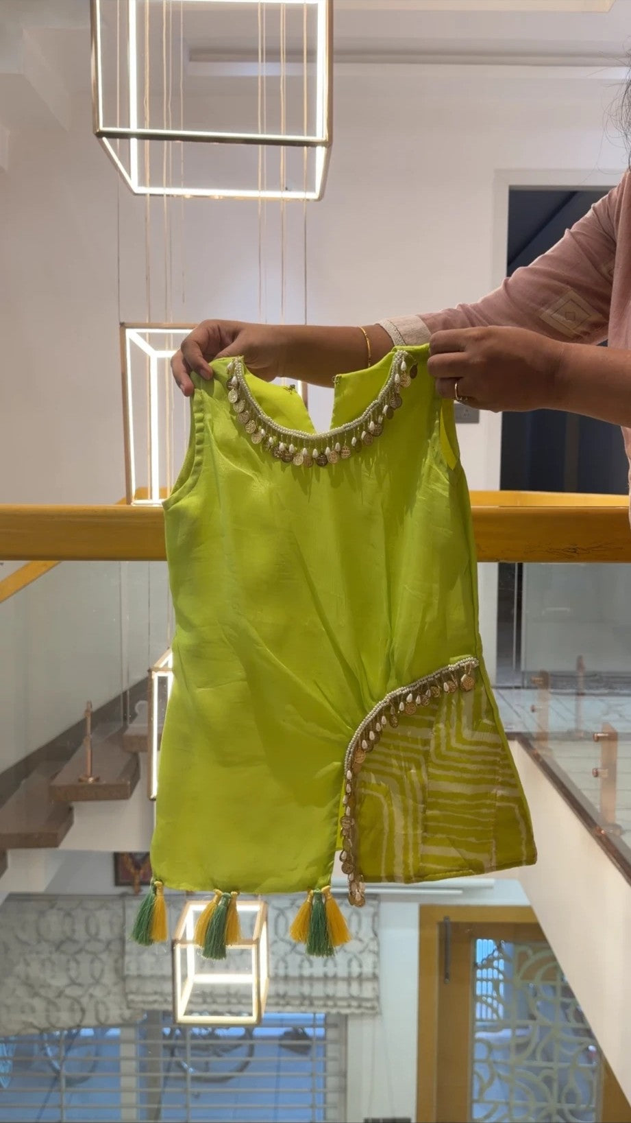Lime green kurta with gold coin lace neckline and tassels