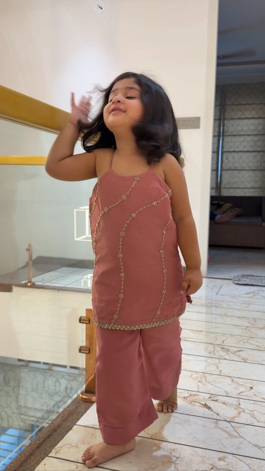 Girl in dusty rose beaded kurta palazzo set